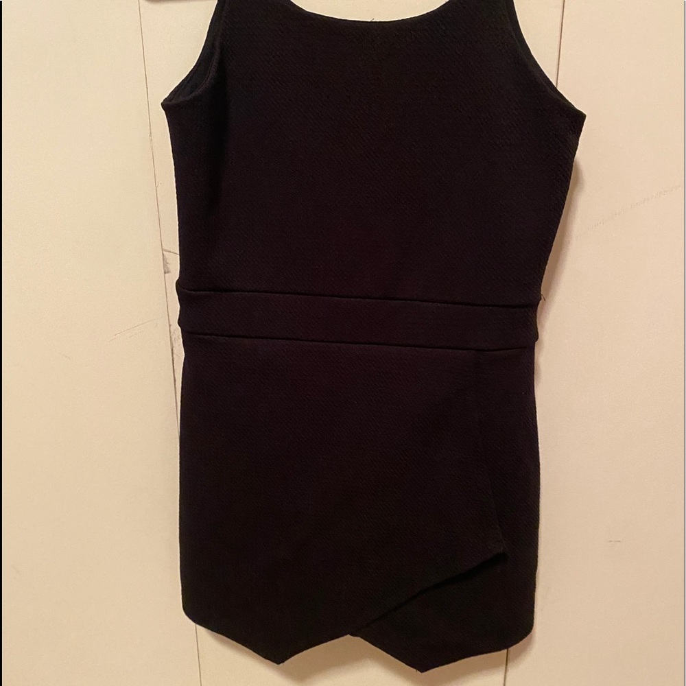 Black romper. Looks like a dress